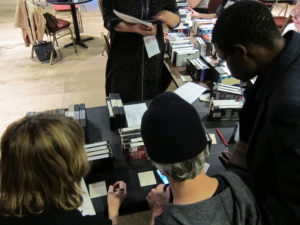 CAW participants inventory a video collection for Attack Theatre, Pittsburgh, PA, 2016